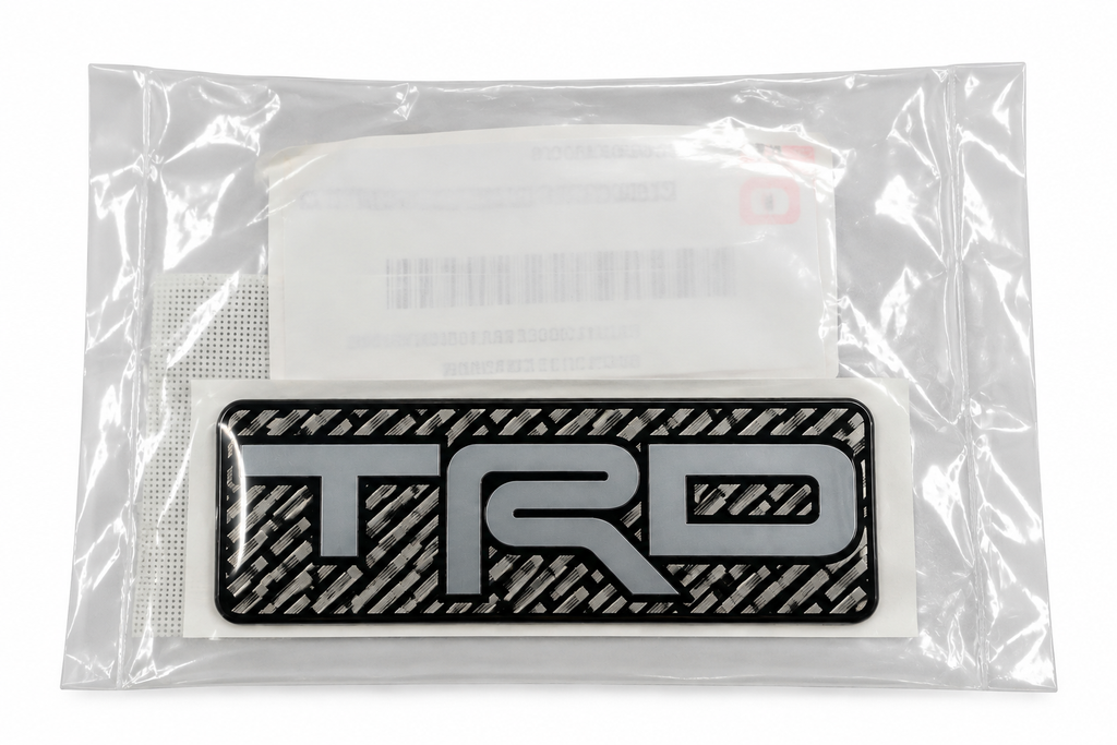 Genuine Toyota TRD Emblem – Reflective Carbon Fiber Look